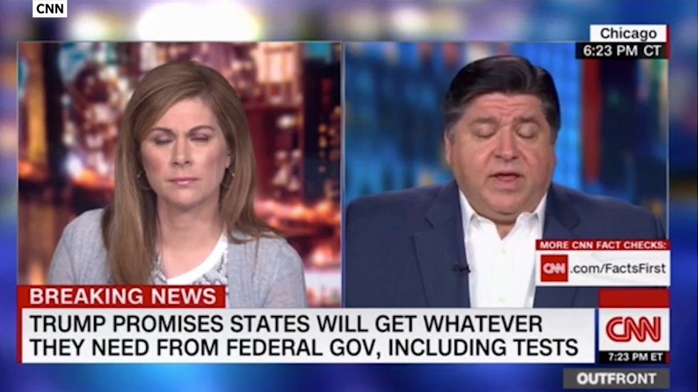 Illinois governor says he's 'given up on' waiting for coronavirus testing help from the federal government