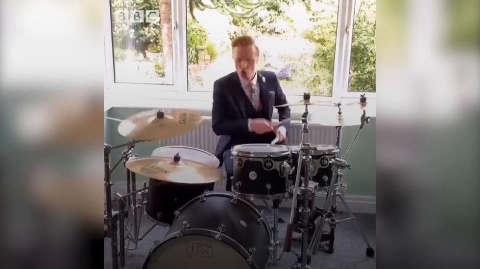 Weatherman recreates BBC News theme tune on home drum kit