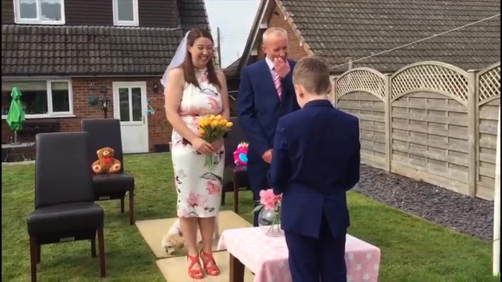 Couple 'get married' in garden after coronavirus cancelled dream wedding