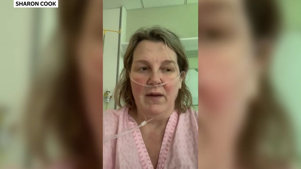 Tearful woman urges people to stay home after battle with coronavirus