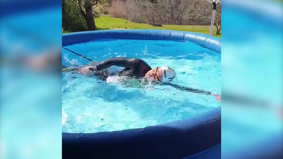 Olympic champion Sharon van Rouwendaal uses inflatable pool to train during isolation