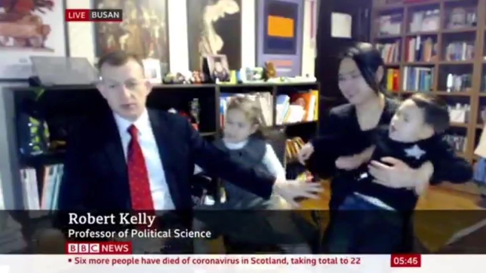 Robert Kelly and his children return to BBC News
