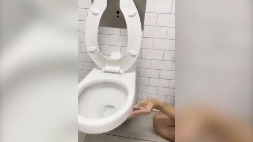 Influencer who licked a toilet as a 'coronavirus challenge' has just been hospitalised with coronavirus