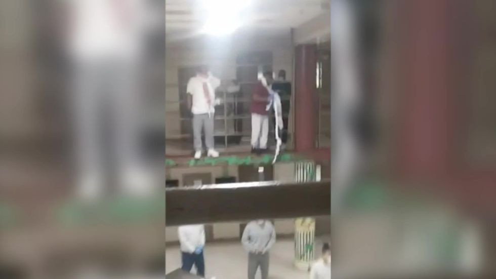 Inmates threaten to hang themselves claim they're locked in with people who have COVID-19