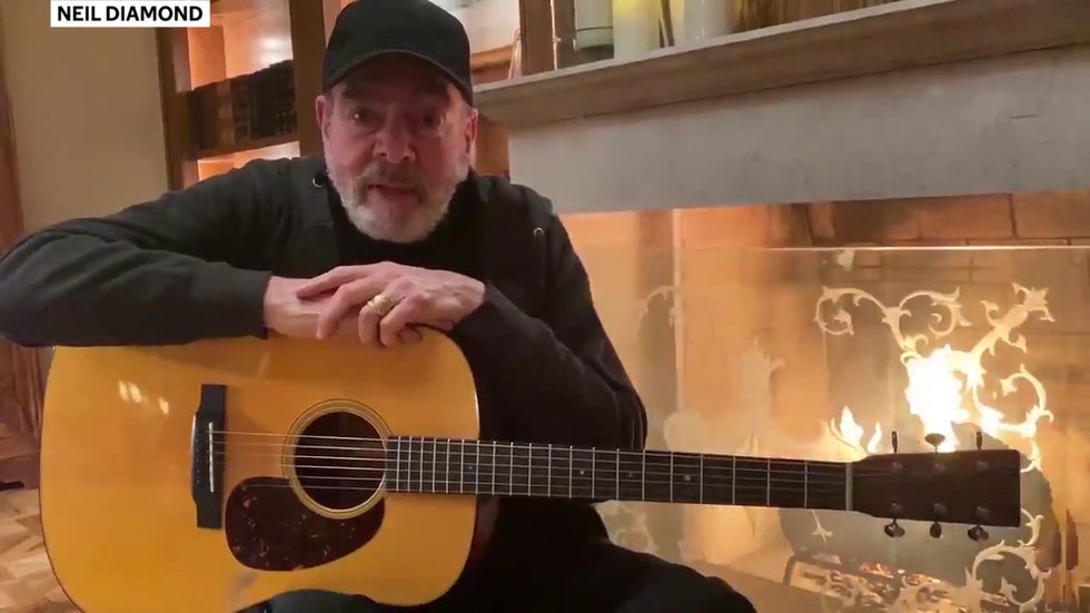 Neil Diamond changes lyrics to 'Sweet Caroline' to encourage fans to wash their hands