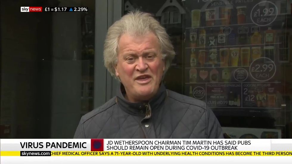 Wetherspoons boss causes outrage after insisting he will keep chain open as 'virus doesn't spread in pubs'