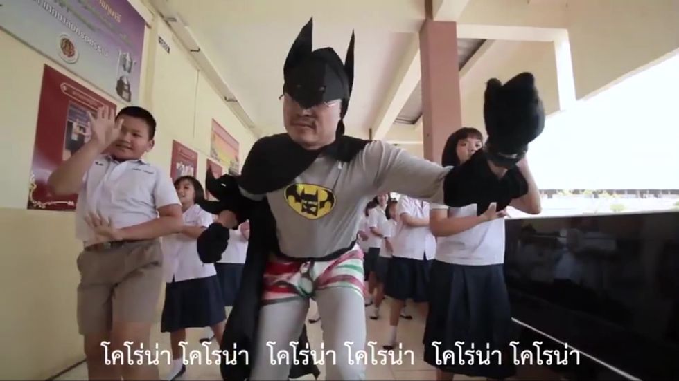 'Corona, corona' Thai 'Batman' fights virus with catchy tune