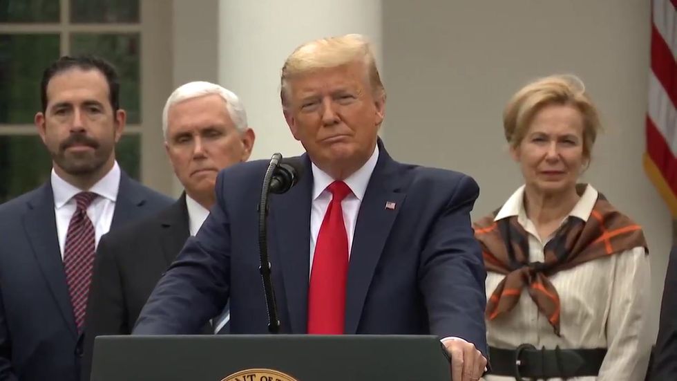 Trump shuns responsibility for cutting pandemic team before White House cuts reporter microphone