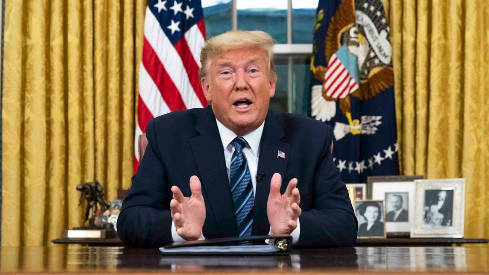 Trump caught on hot mic before announcing unprecedented travel ban over coronavirus