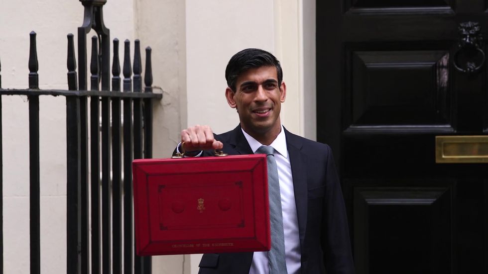 Chancellor Rishi Sunak leaves Downing Street ahead of his first ever budget statement