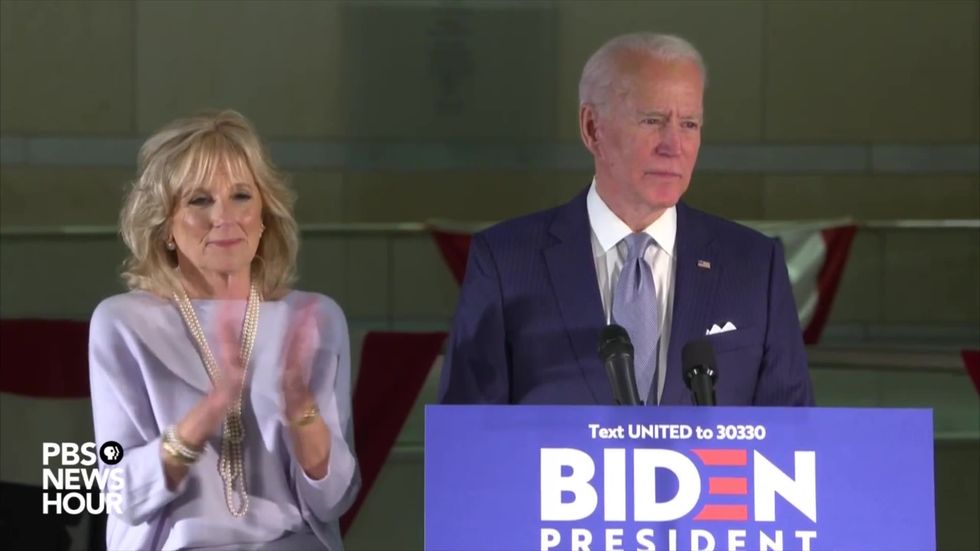 Biden calls for unity after decisive win over Sanders