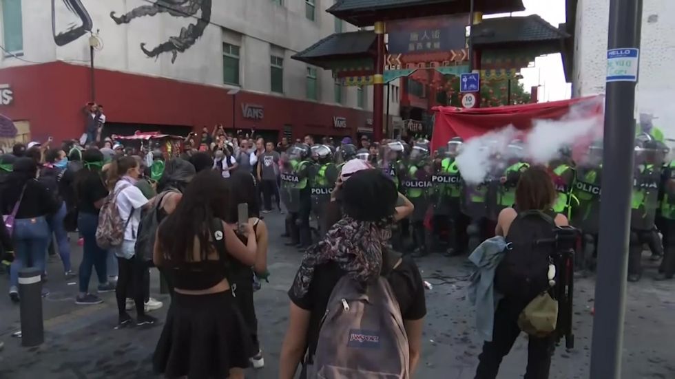 Police and protesters clash in Mexico City during Women's Day
