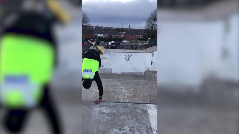 Police officer blasted on social media after video of him roller skating while on patrol goes viral