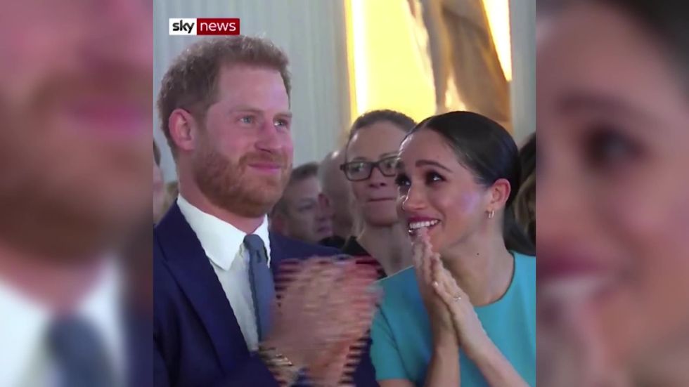 Man proposes on stage in front of Prince Harry and Meghan