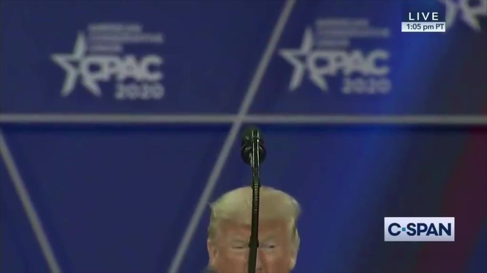 Trump crouches behind podium to mock Bloomberg's height