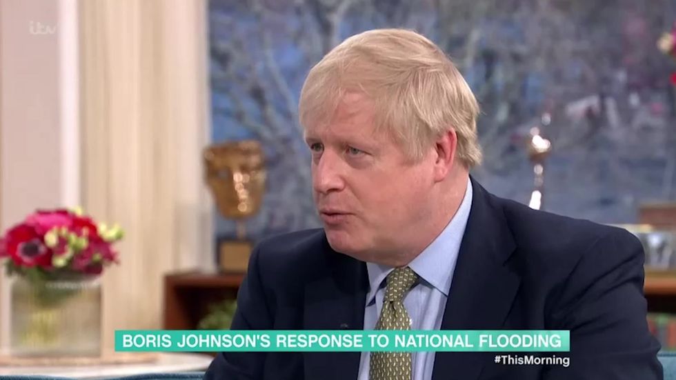 Boris Johnson claims he didn’t go to flood areas because he was told he would disrupt emergency workers