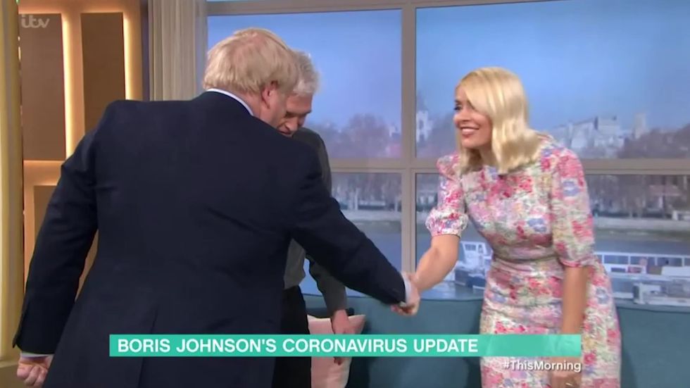 Boris caught on camera shaking Philip and Holly's hands before This Morning appearance
