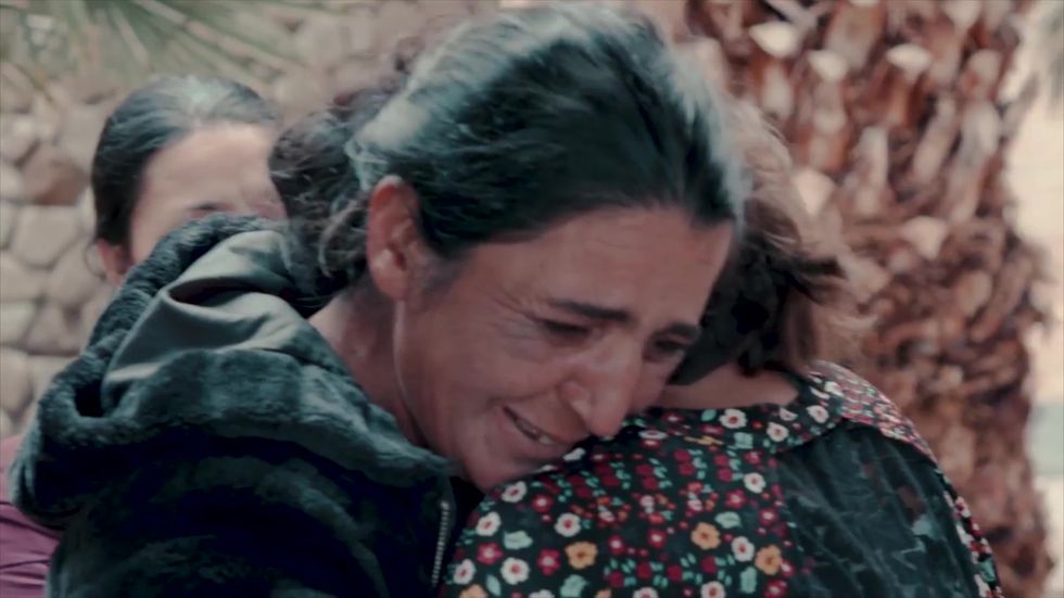 Woman trafficked at birth reunited with family 25 years later