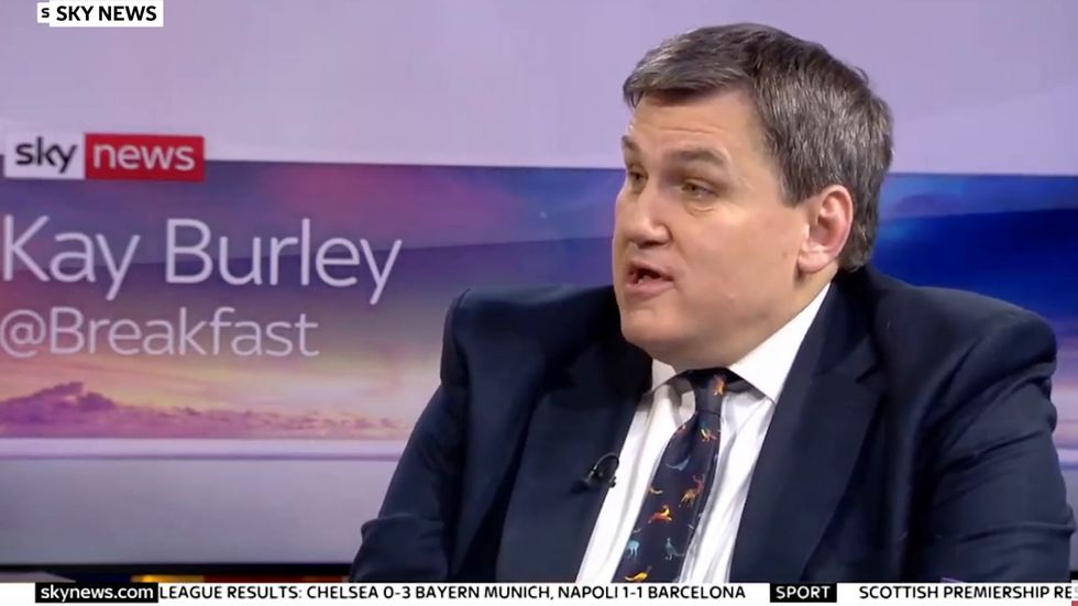 Police minister defends Tory MP who exposed himself in pub