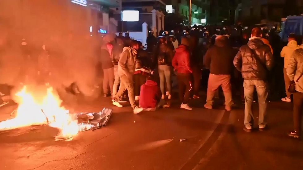 Riot police sent in as Greek islanders protest refugee camps' construction