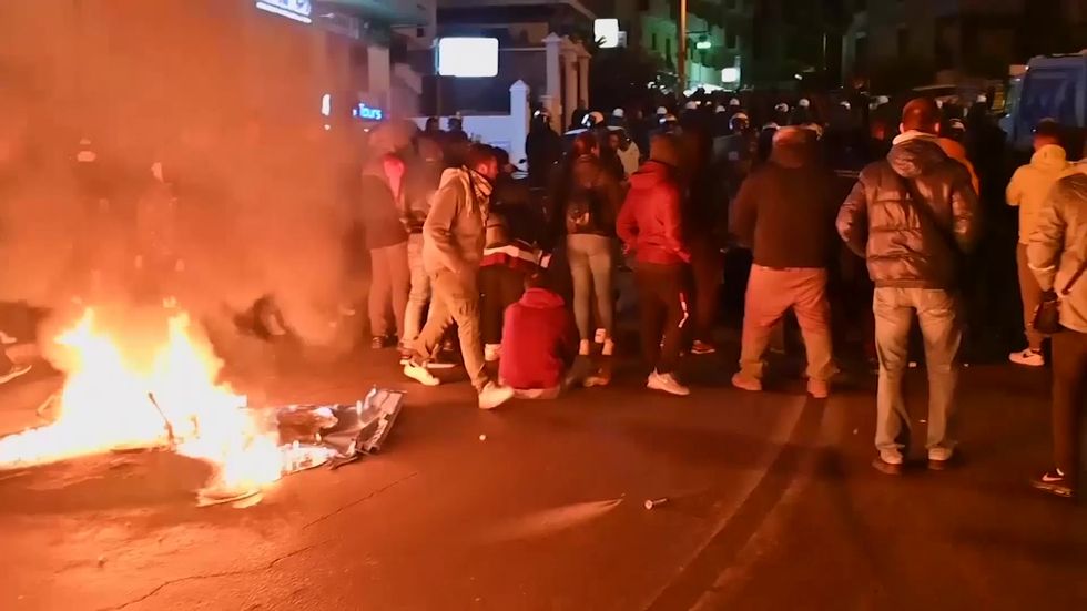Riot police sent in as Greek islanders protest refugee camps' construction