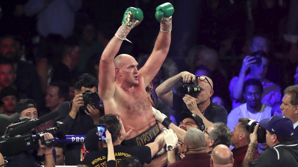 Fury produces stunning fight to stop Wilder and win WBC world heavyweight title