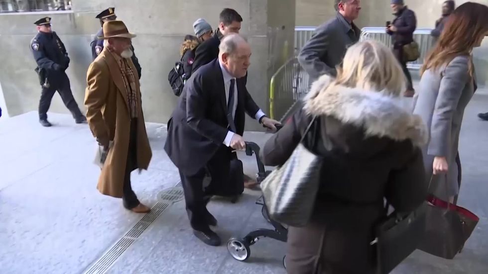 Harvey Weinstein and his legal team arrive at courthouse on Friday