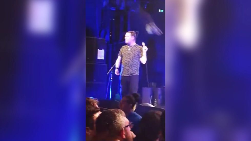 Fan throws late friend's ashes on stage during concert