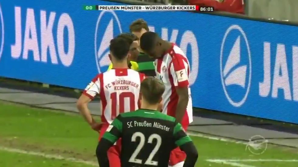 Football fans come together to denounce racism after horrific slurs hurled at black German player