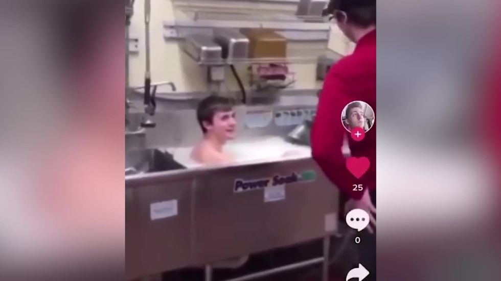 Wendy's employees fired after worker bathes in sink