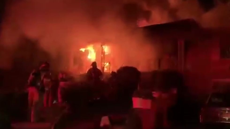 Video shows ferocious fire at Atlanta home where firefighters rescued a woman trapped inside