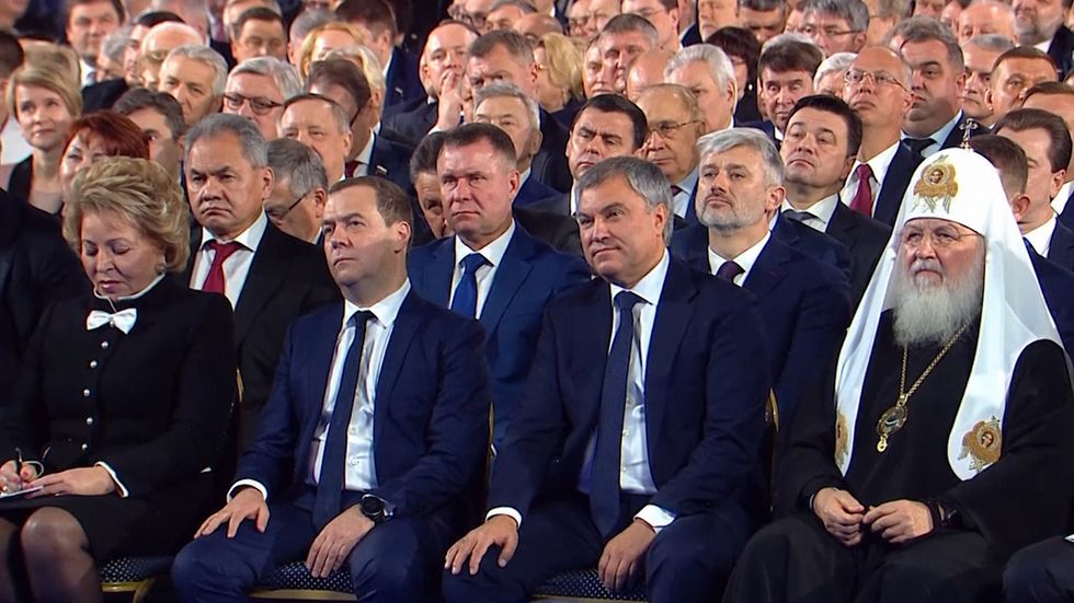 Dmitry Medvedev listens as Putin proposes switching power to parliament in sweeping overhaul of Russia’s constitution