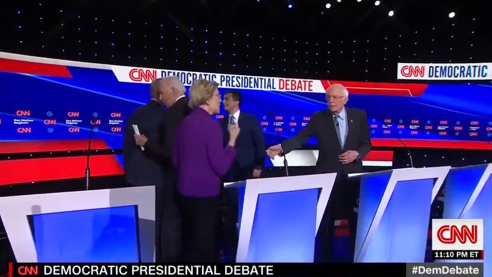 Elizabeth Warren appears to reject Bernie Sanders' handshake after Iowa debate