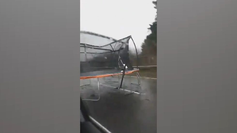 Trampoline seen hurtling down motorway as Storm Brendan pummels UK and Ireland