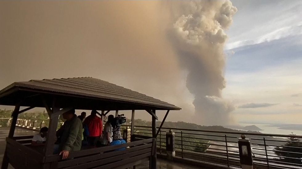 Philippines' Taal volcano ejects smoke and ash, villagers flee