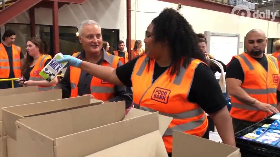 Lizzo volunteers at Australian food bank