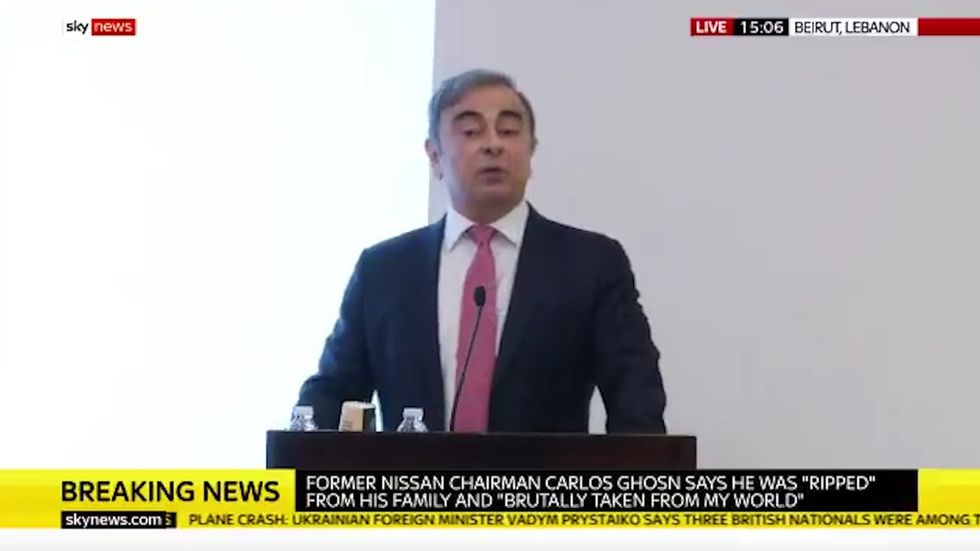 Former Nissan chairman Carlos Ghosn says he was 'ripped from his family' after being charged in Japan with financial misconduct charges