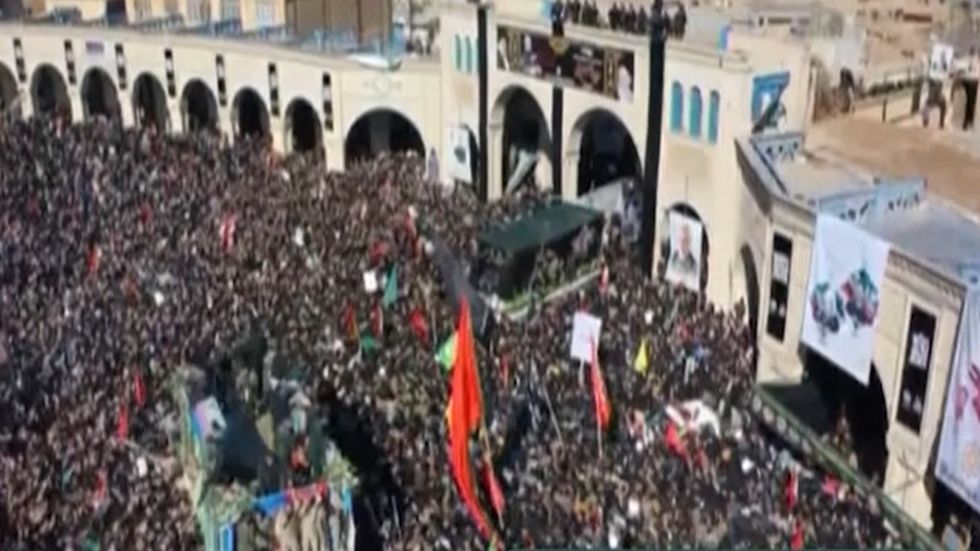 Huge crowds surround funeral procession of Soleimani as it moves through Kerman, Iran