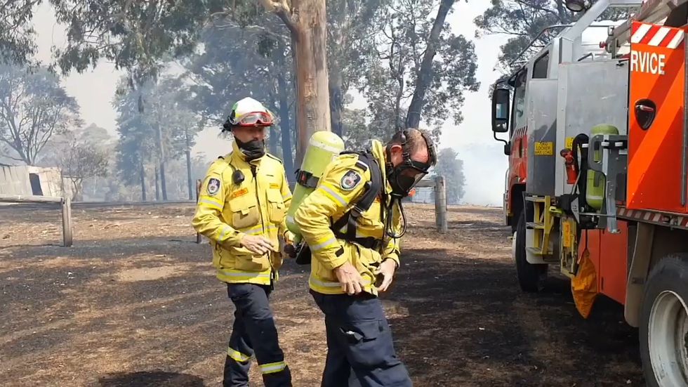 Former Australian PM Tony Abbott runs into burning building while volunteering in wildfire effort