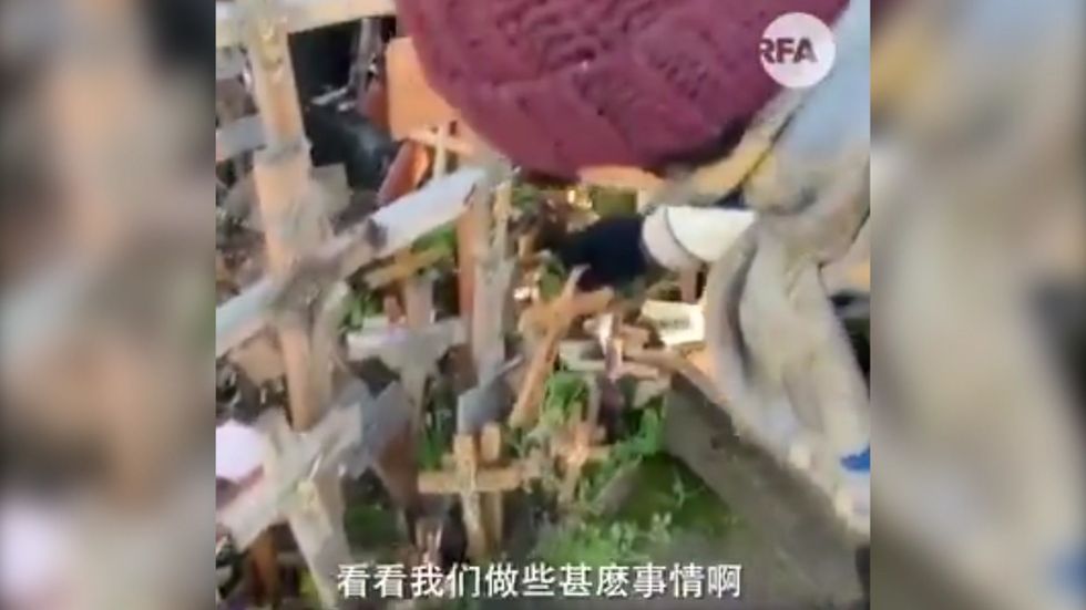 Hunt for Chinese tourist who 'vandalised' sacred religious site in Europe to remove message of support for Hong Kong protests