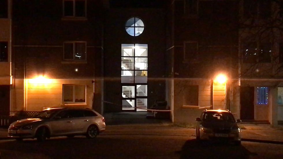 Scene in north Belfast where a male and female have died in what is believed to be suspected stabbing