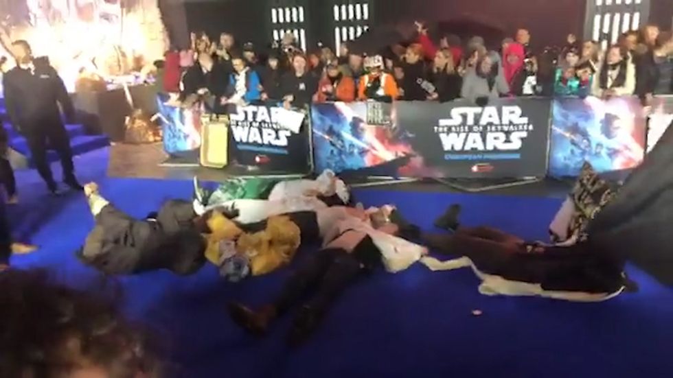 Extinction Rebellion protesters lie on red carpet at Star Wars premiere in London