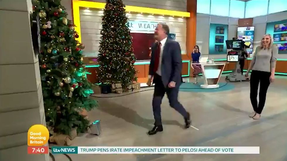 Piers Morgan tries and fails to beat Fallon Sherrock at a game of darts