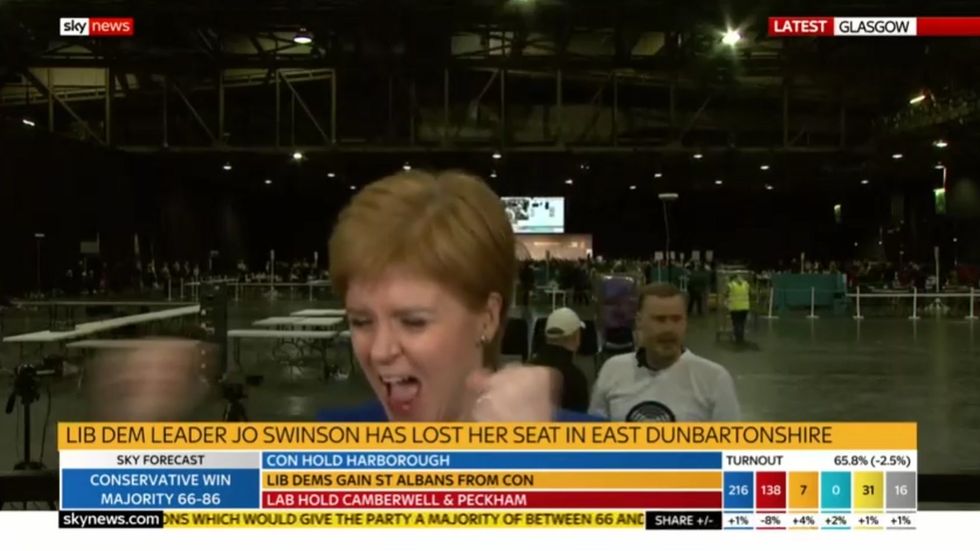 General Election: Nicola Sturgeon caught celebrating on camera as she hears news of Jo Swinson's seat being taken by SNP