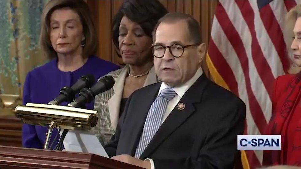 Trump impeachment charges unveiled as president accused of abuse of power and obstruction
