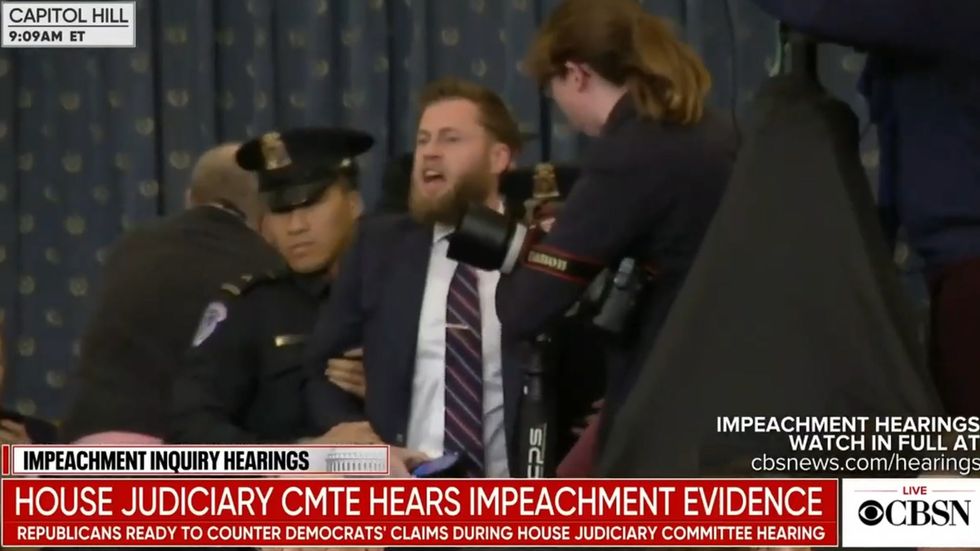 Pro-Trump protester disrupts impeachment hearing