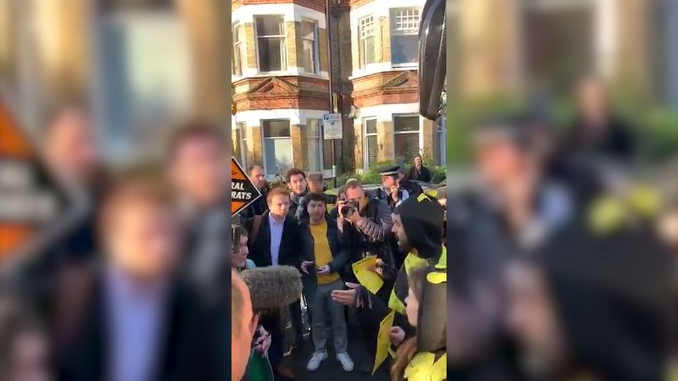 Jo Swinson called 'patronising' by Extinction Rebellion activists dressed as bees