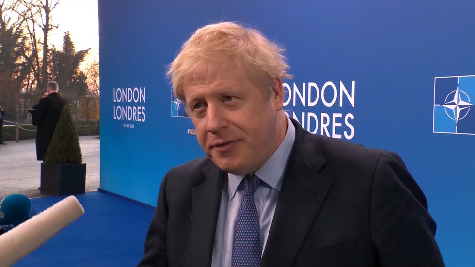 Boris Johnson arrives at Nato summit in Watford