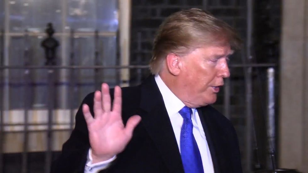 Donald Trump ignores impeachment question as he leaves Downing Street