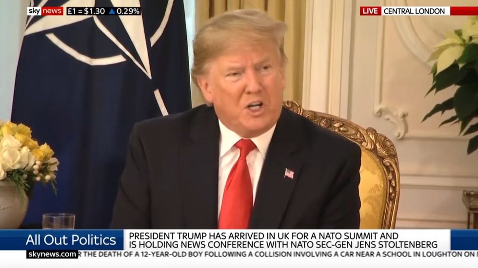 Donald Trump pledges to 'stay out' of election before complimenting Boris Johnson